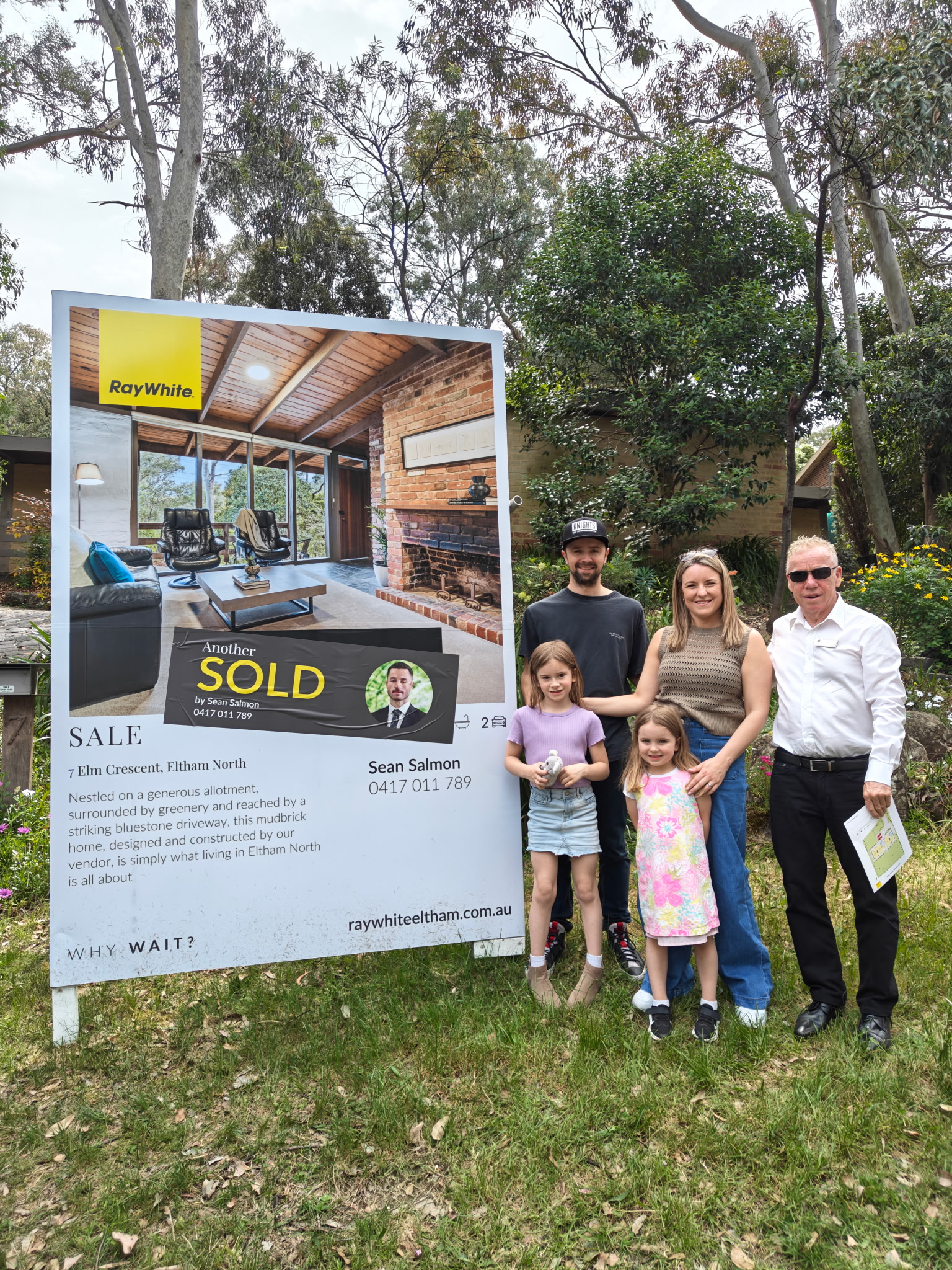MPS Advocates with vendor clients and their family beside a sold property board in Eltham North